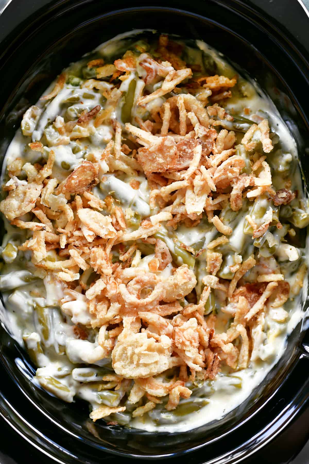 slow cooker green bean casserole with french fried onions on top