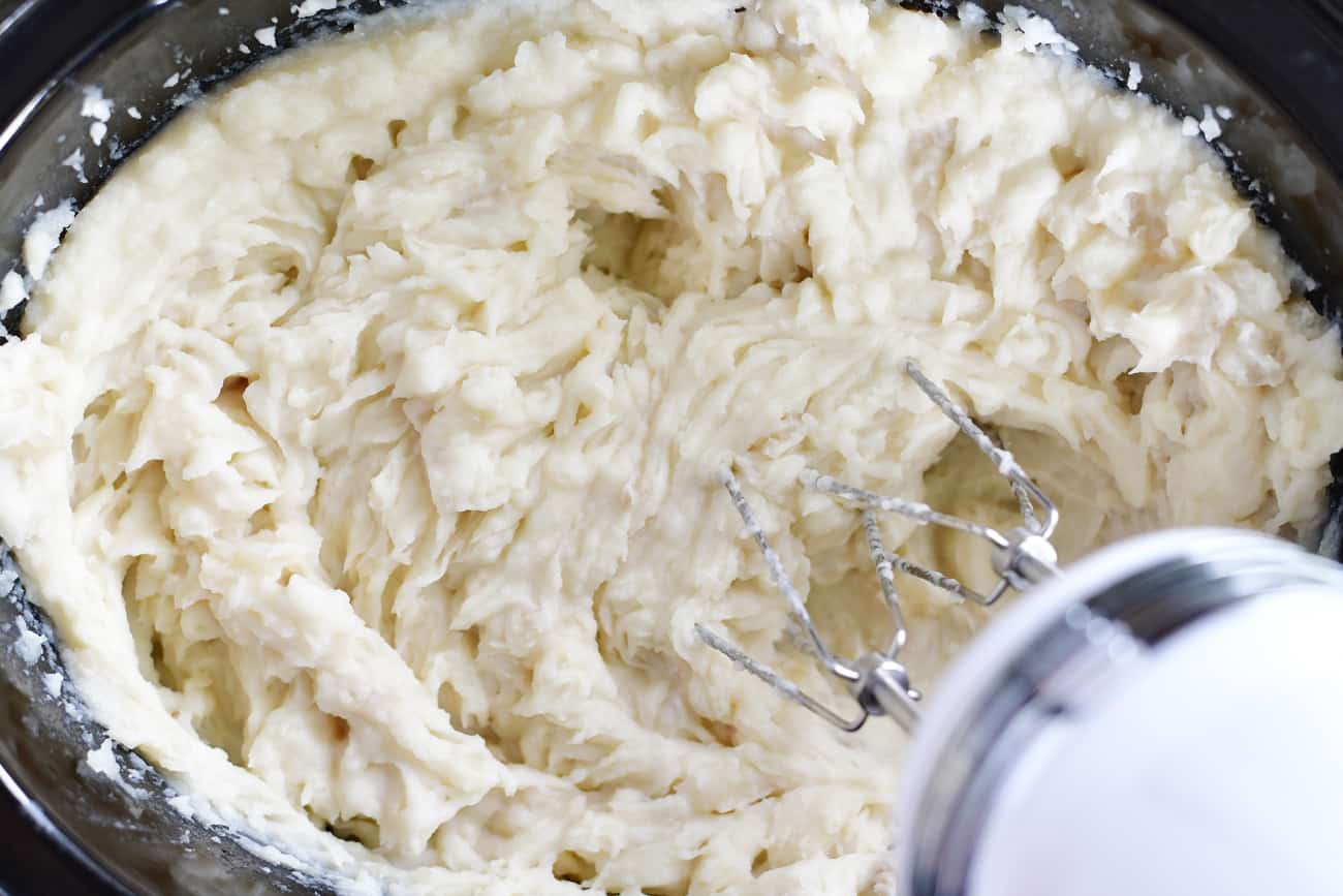use mixer to beat slow cooker mashed potatoes