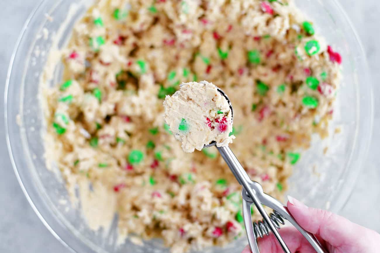 scoop of Christmas oatmeal M & M cookie dough