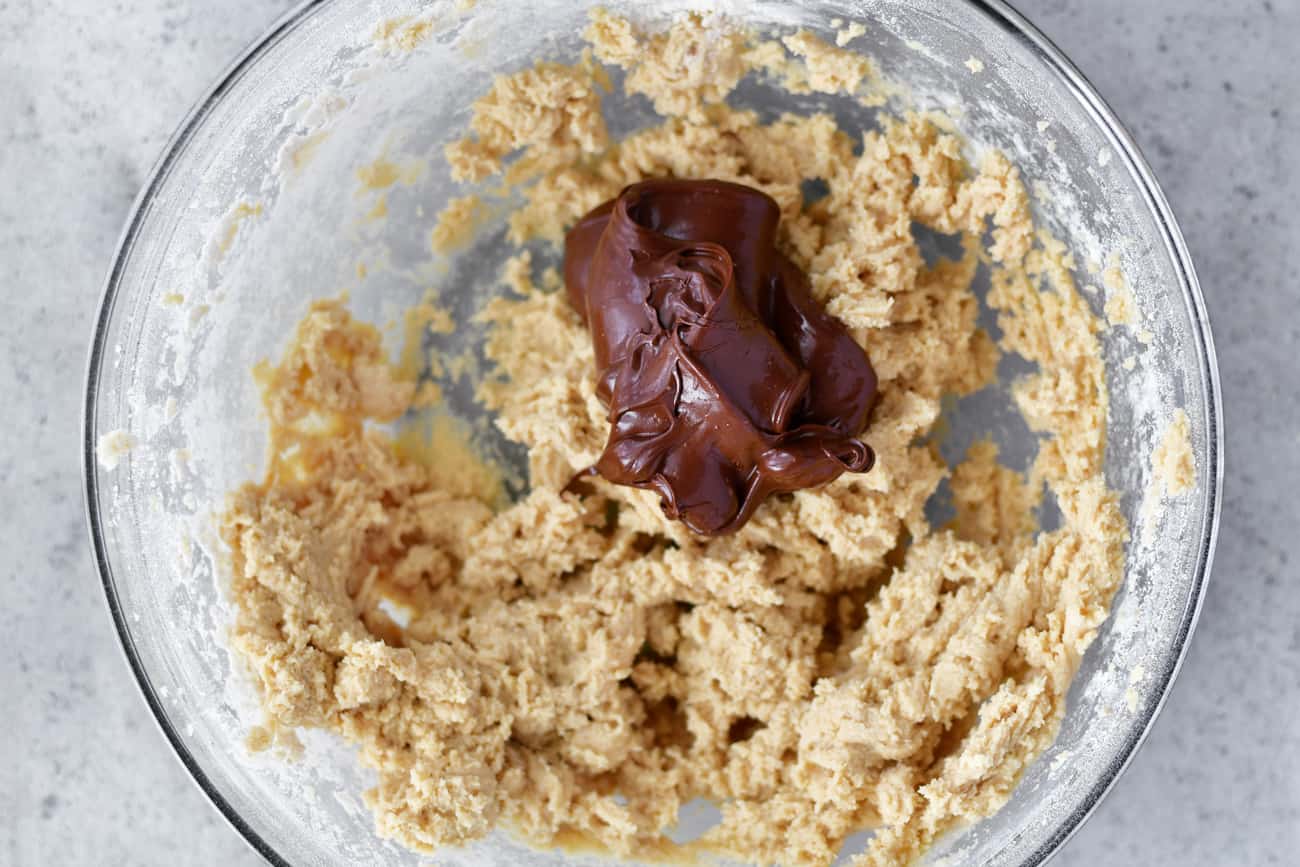 add melted chocolate chips to chocolate cookie dough