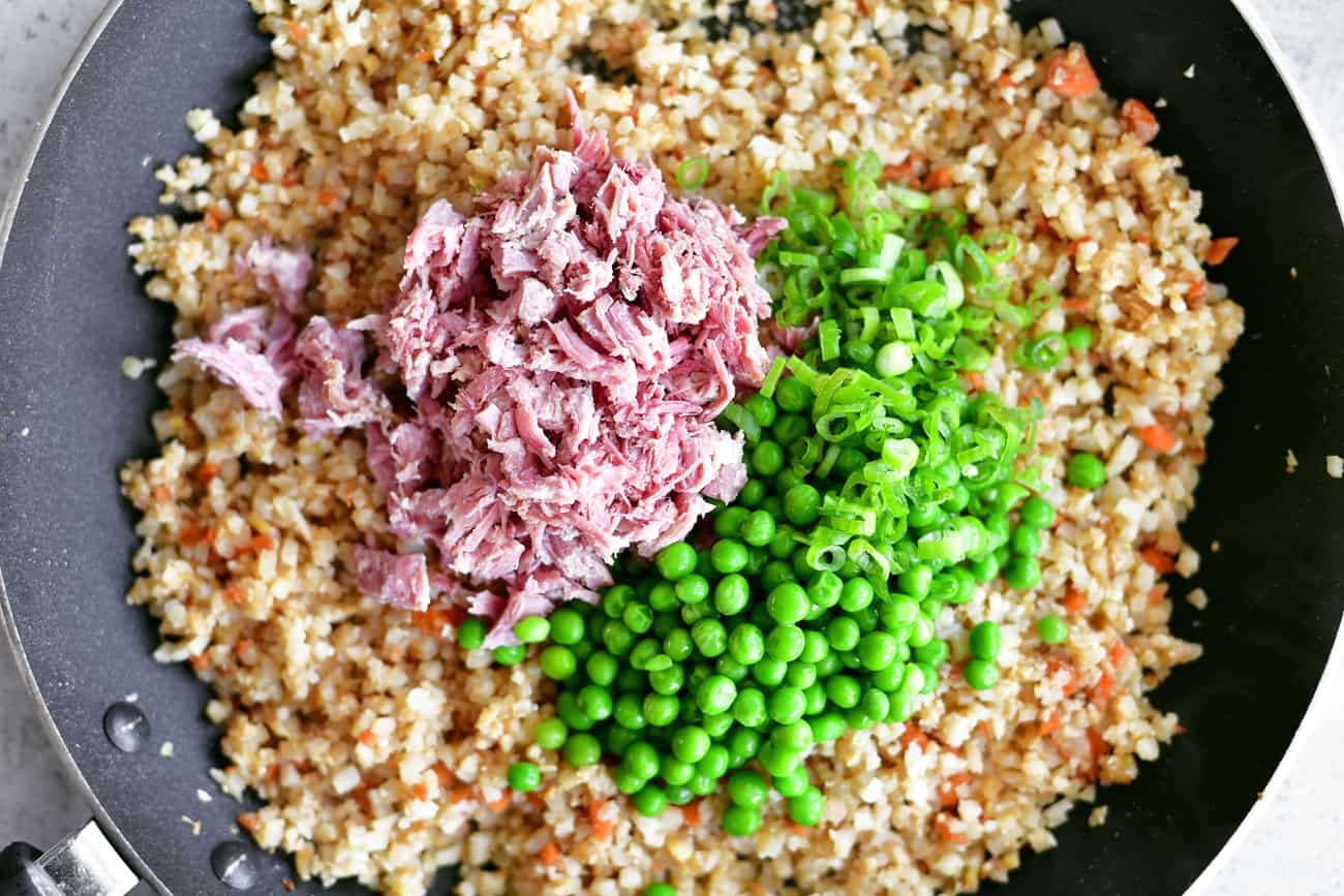shredded pork peas and onions added to riced cauliflower