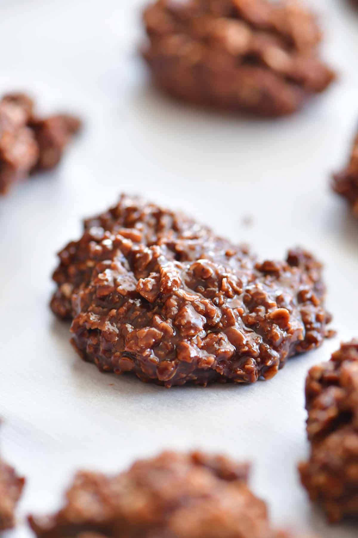 chocolate no bake cookies on parchment paper