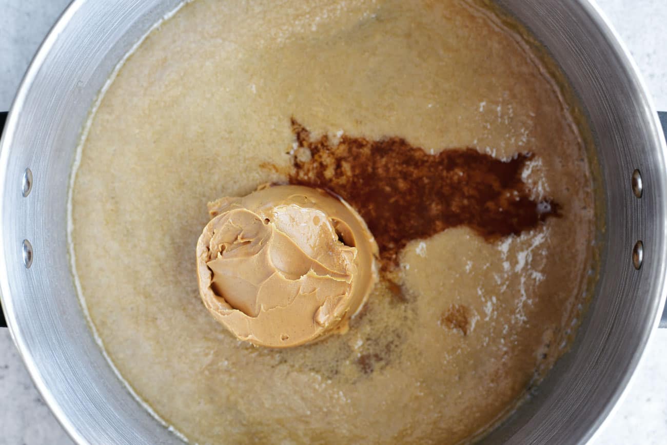peanut butter in saucepan with boiled sugar mixture
