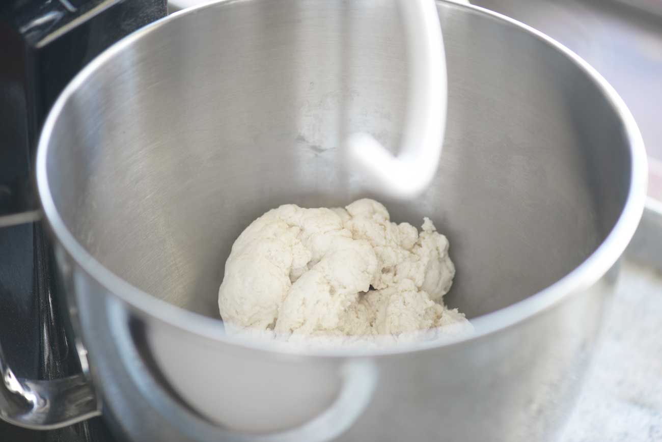kneaded dough in mixing bowl