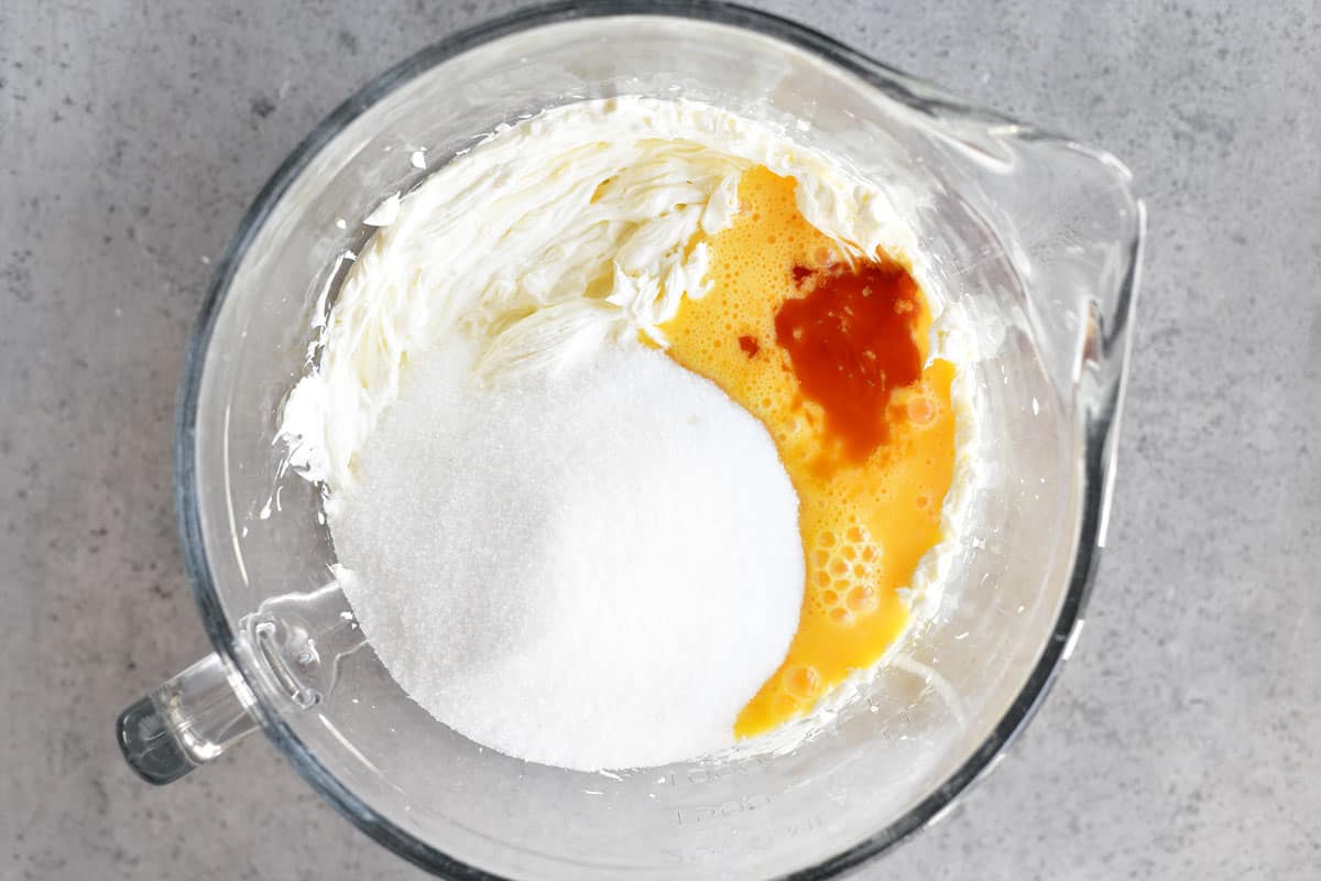 cream cheese, sugar, beaten eggs, and vanilla extract for banana cheesecake dessert