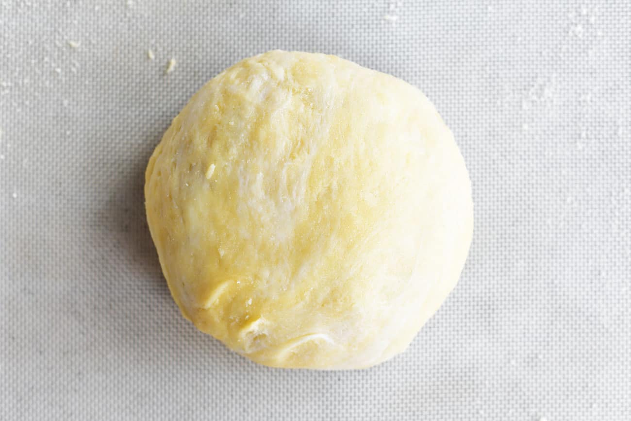 ball of low carb bagel dough on a silicone mat