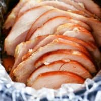 sliced ham in a slow cooker