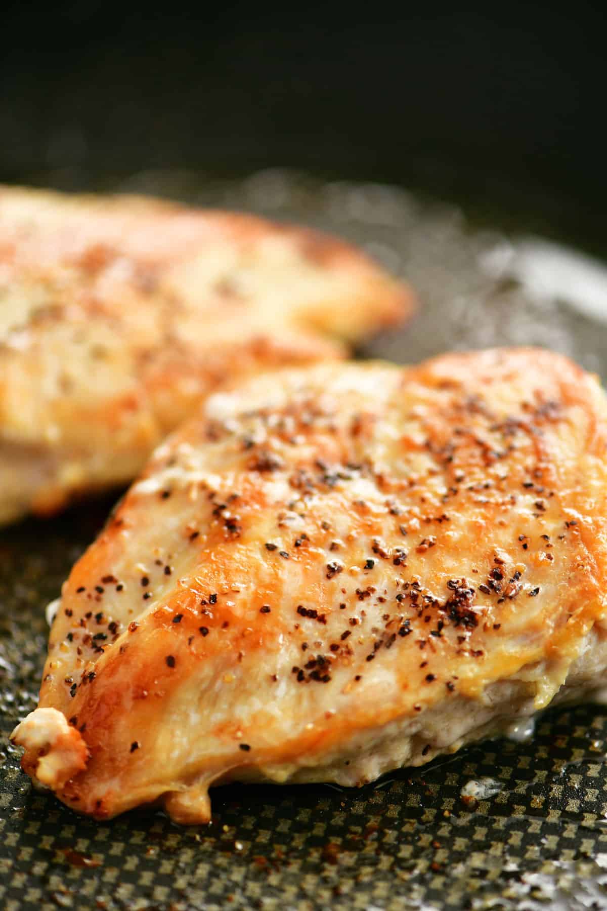 chicken breasts cooked on the stove