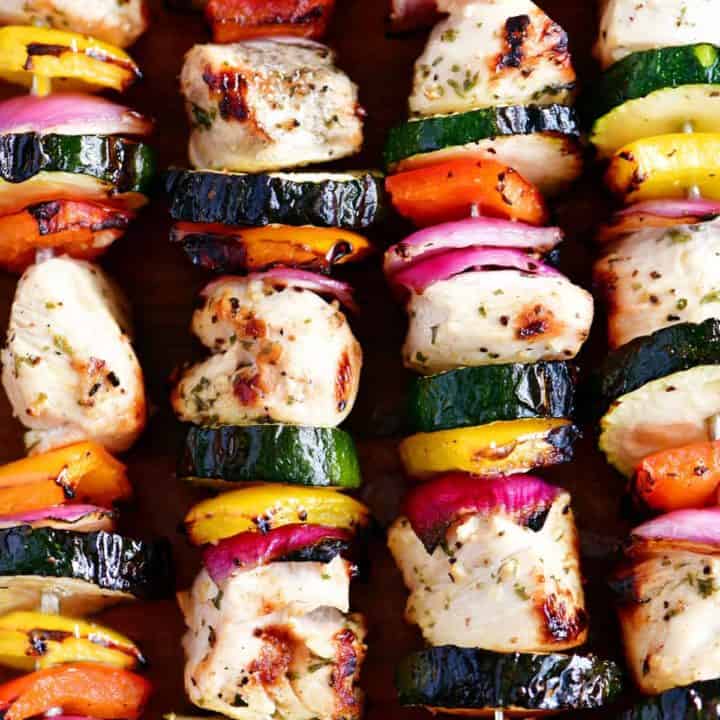 grilled garlic herb chicken kabobs with peppers onions and zucchini