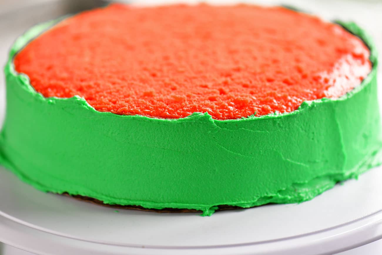 green frosting on outside of cake