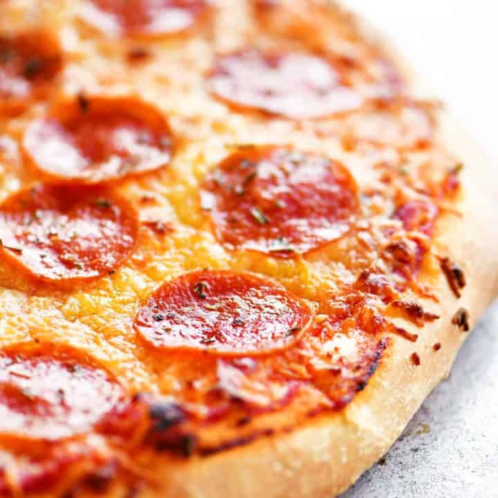 pepperoni pizza grilled on a stone
