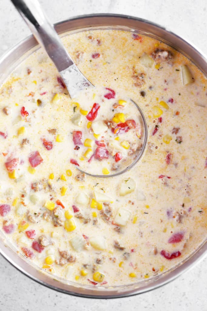 corn and sausage chowder in a large pot