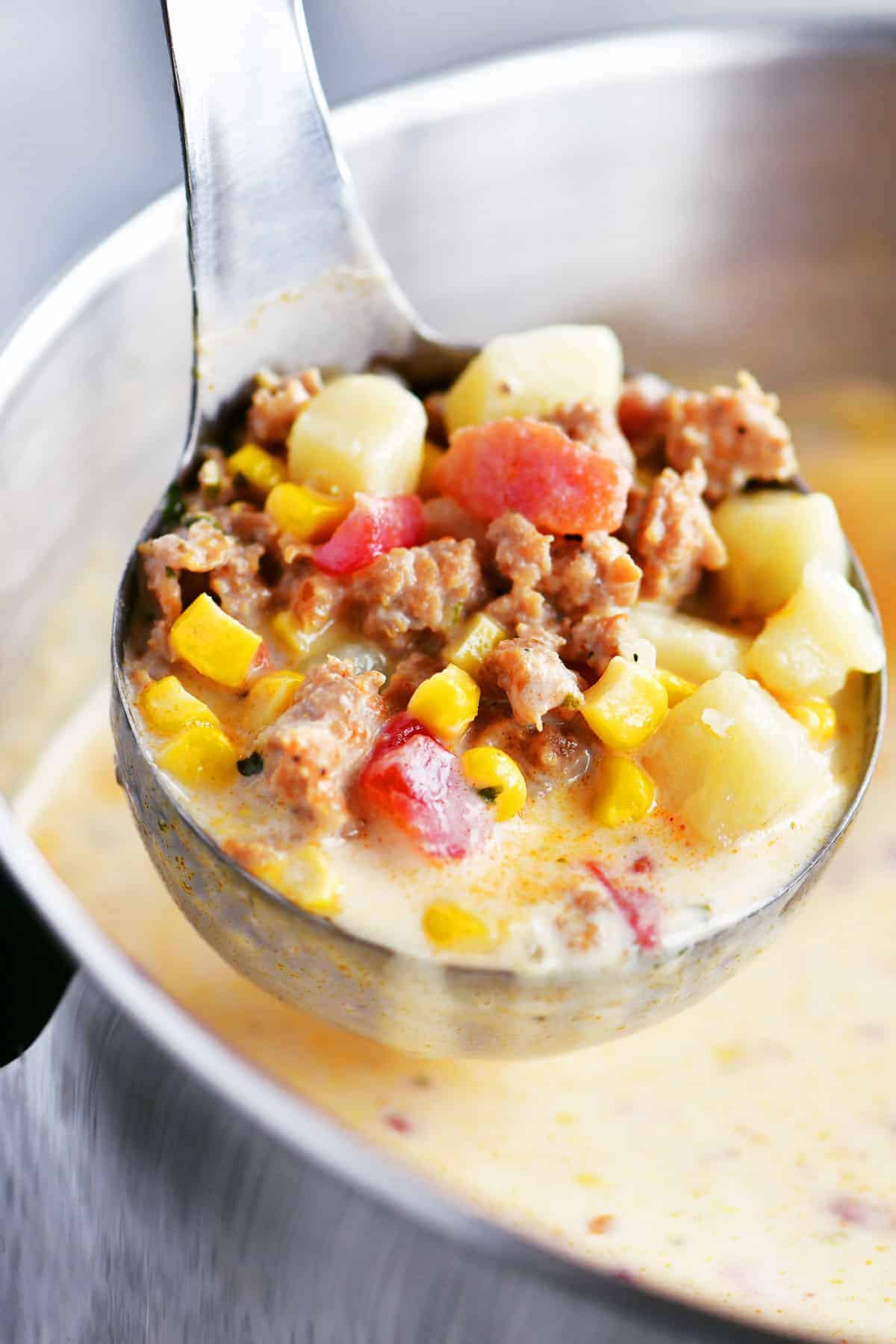ladle of corn and sausage chowder