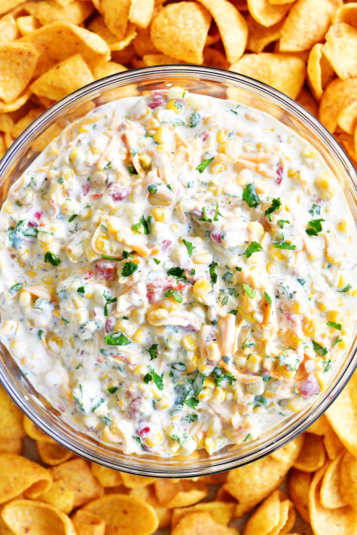 top view of corn dip in bowl with chips