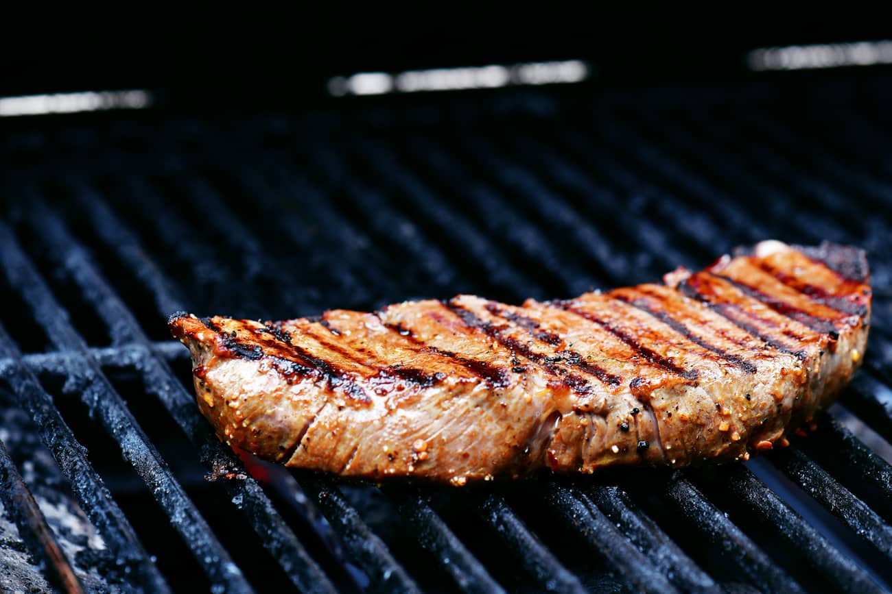 steak cooking on a grill