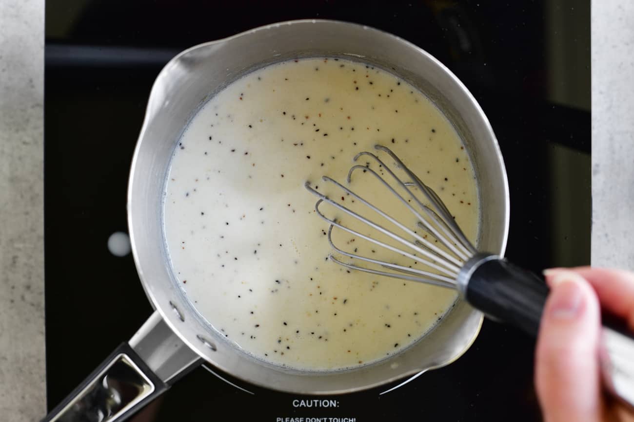 whisk milk into gravy in saucepan
