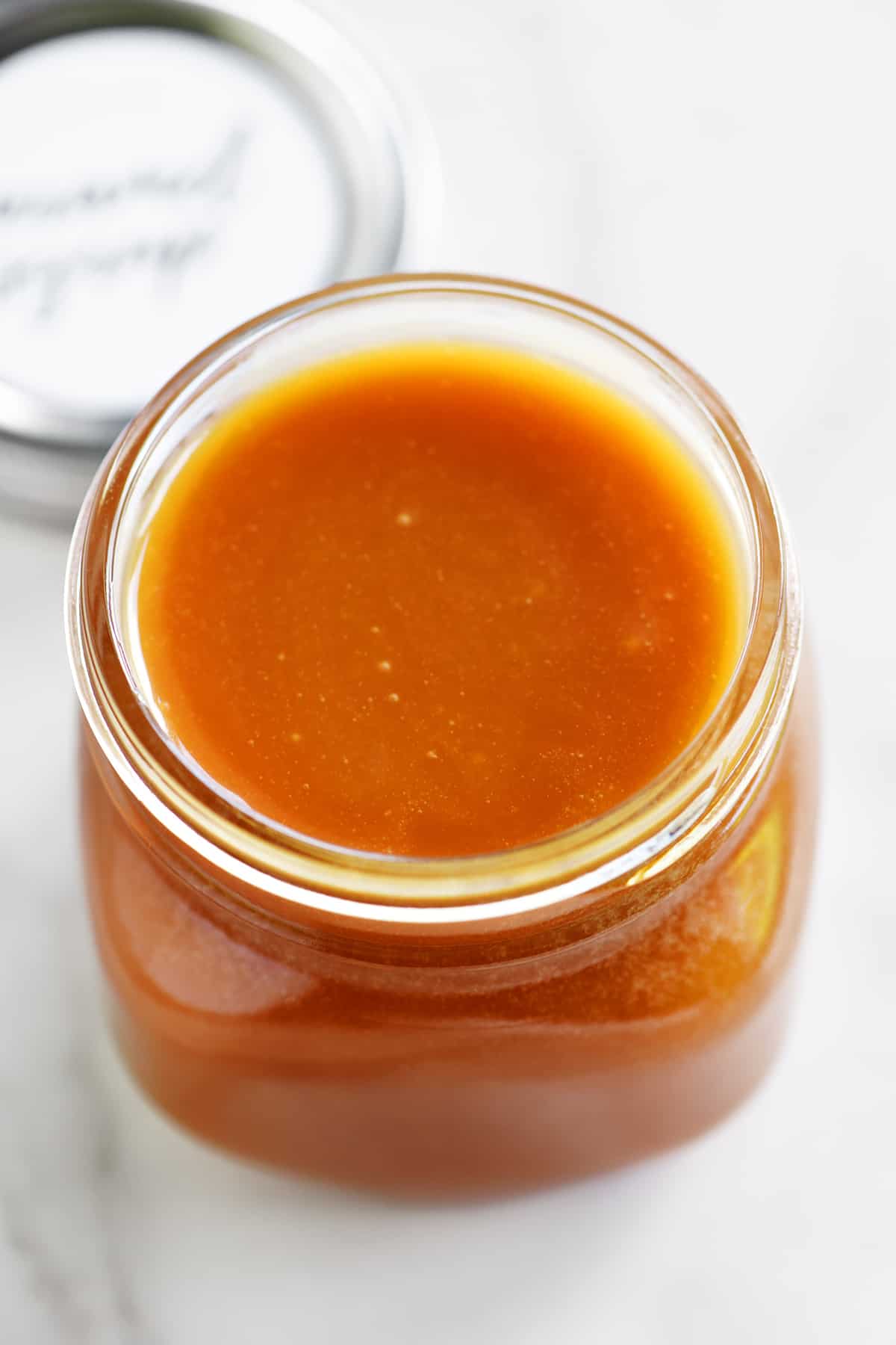 inside mason jar of caramel syrup