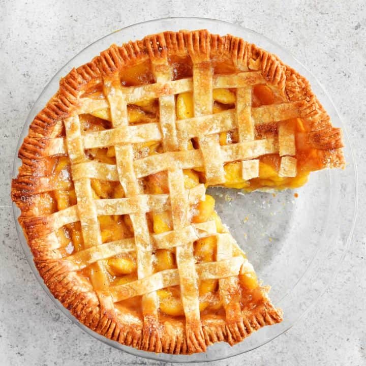 peach pie with slice removed