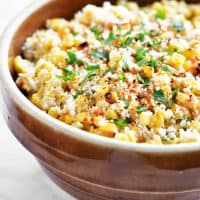 mexican street corn salad in a brown bowl
