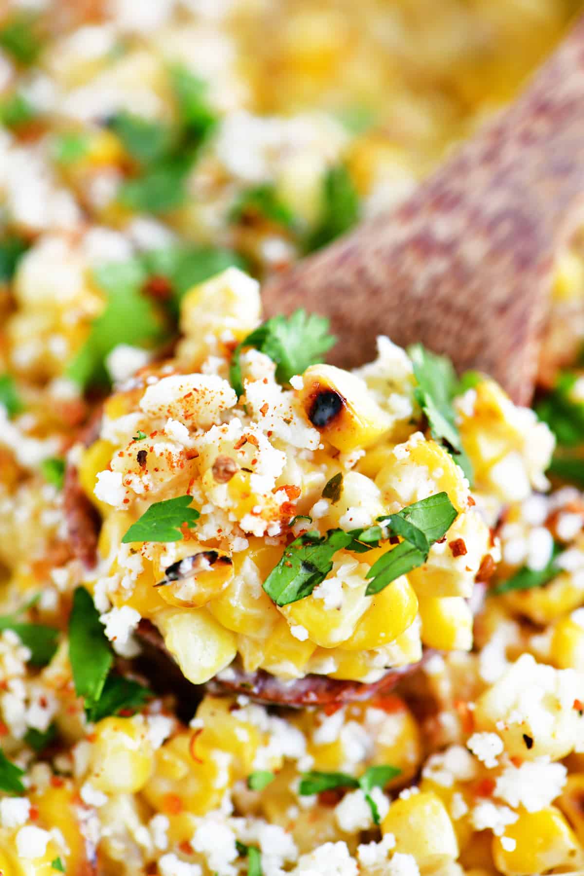 wooden spoonful of mexican corn salad