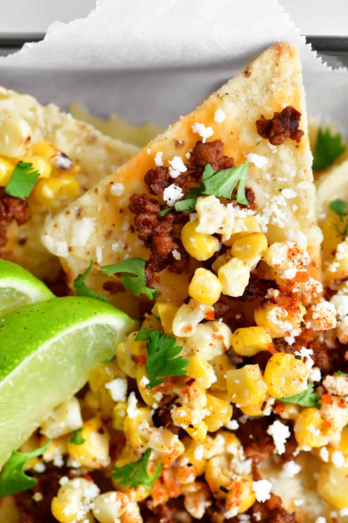 a close-up photo of delicious street corn nachos