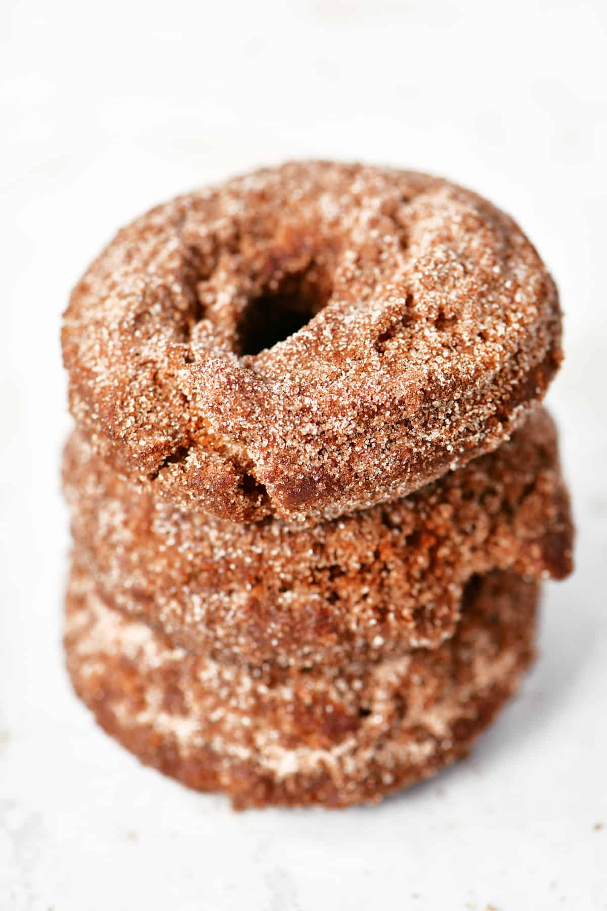 3 apple cider donuts stacked