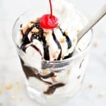 a delicious hot fudge sundae with a cherry on top