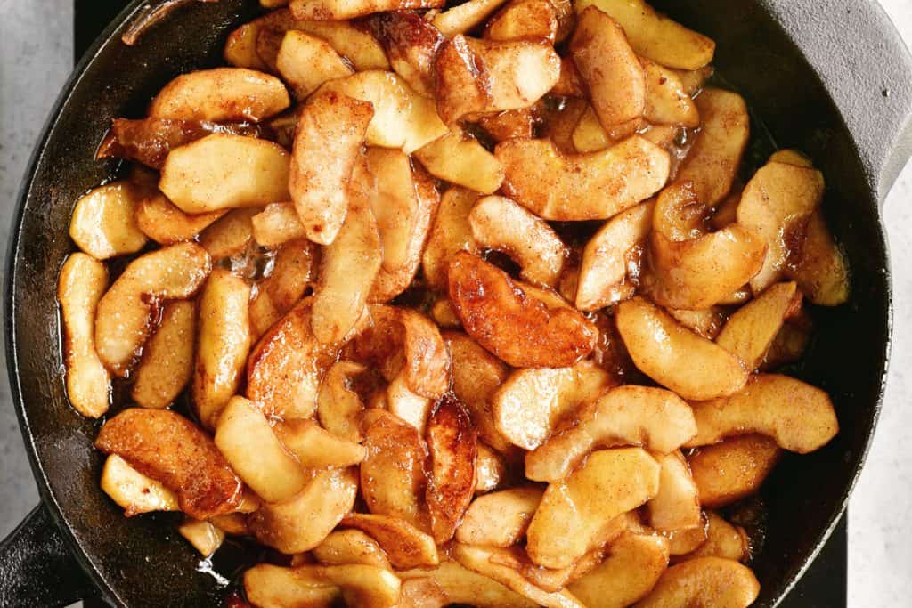 fried apples in a cast iron skillet