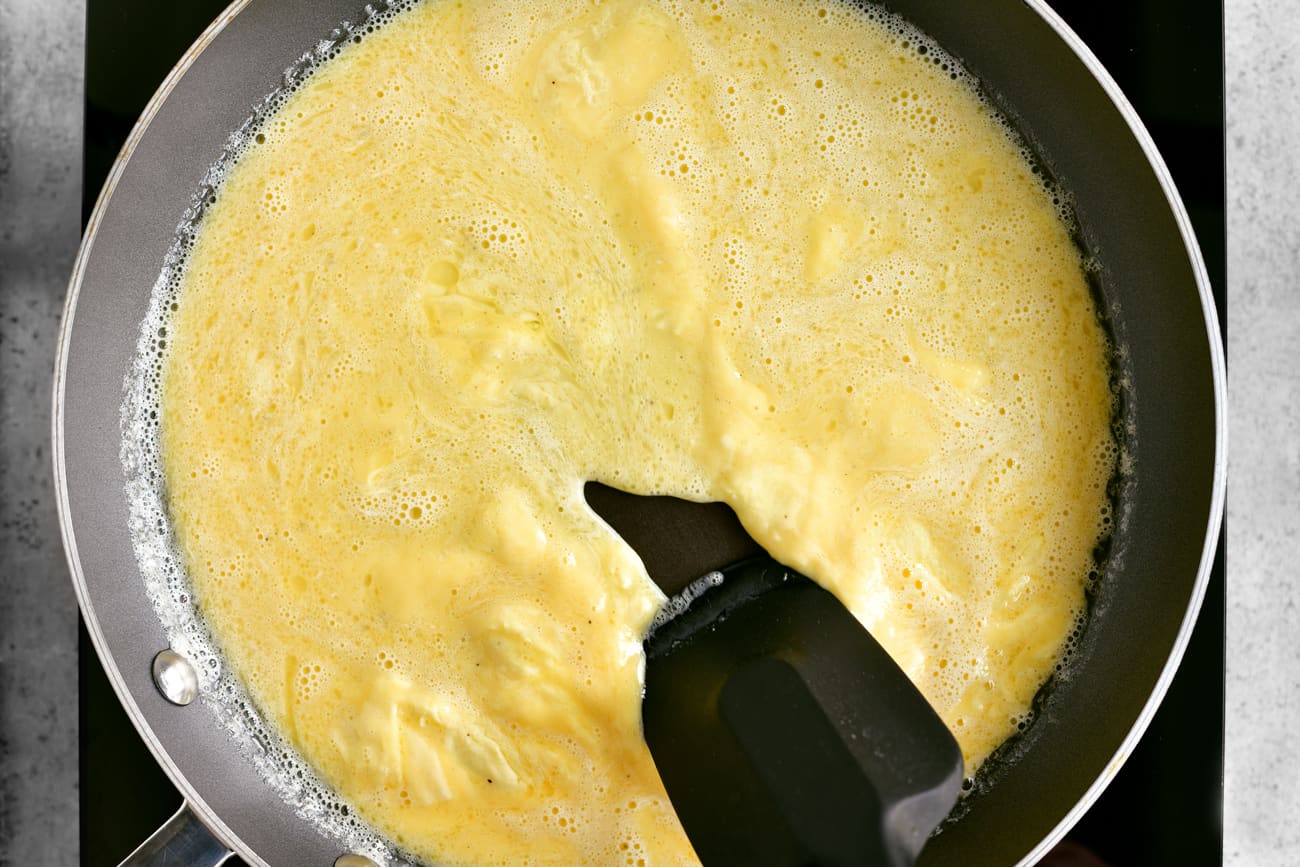 cooking eggs in a pan