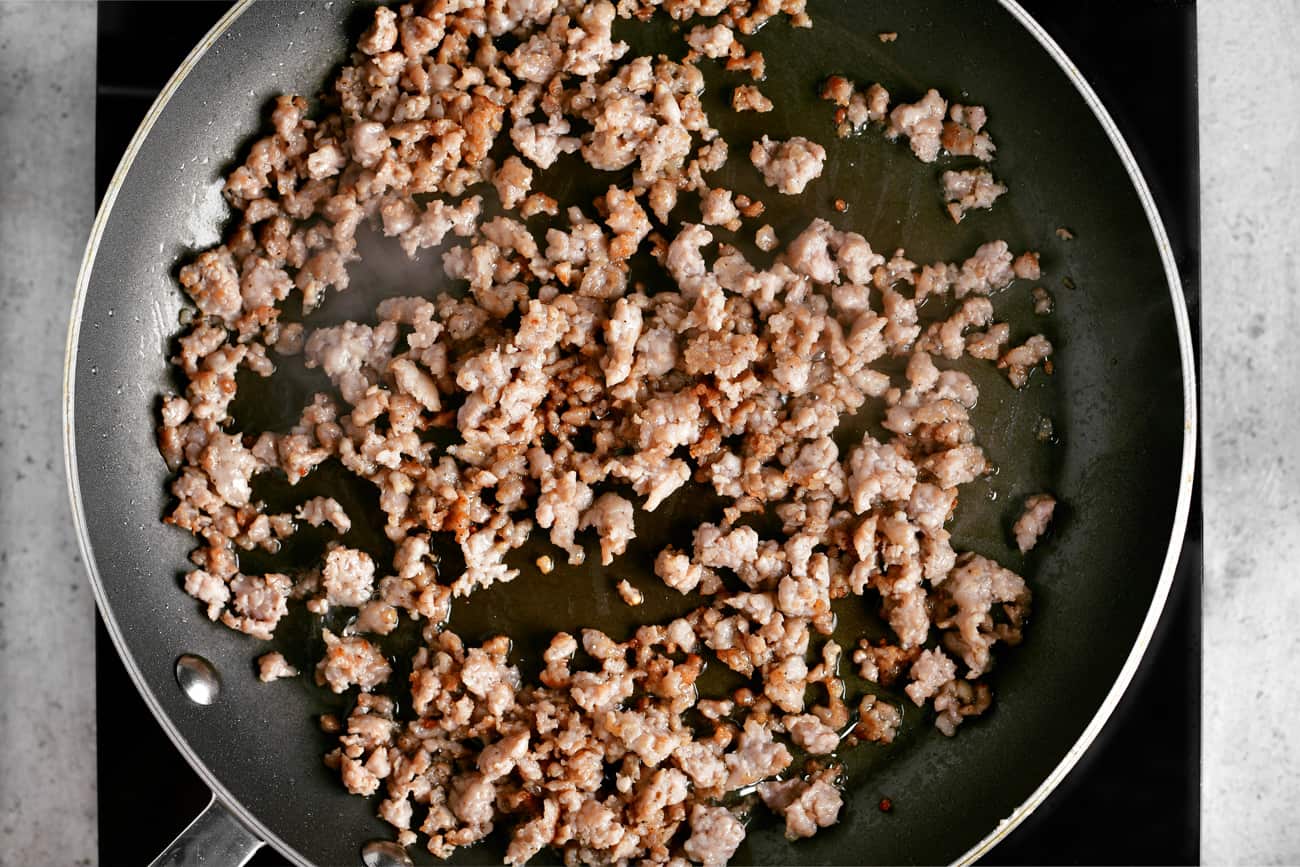 a photo of ground beef browning in a frying pan