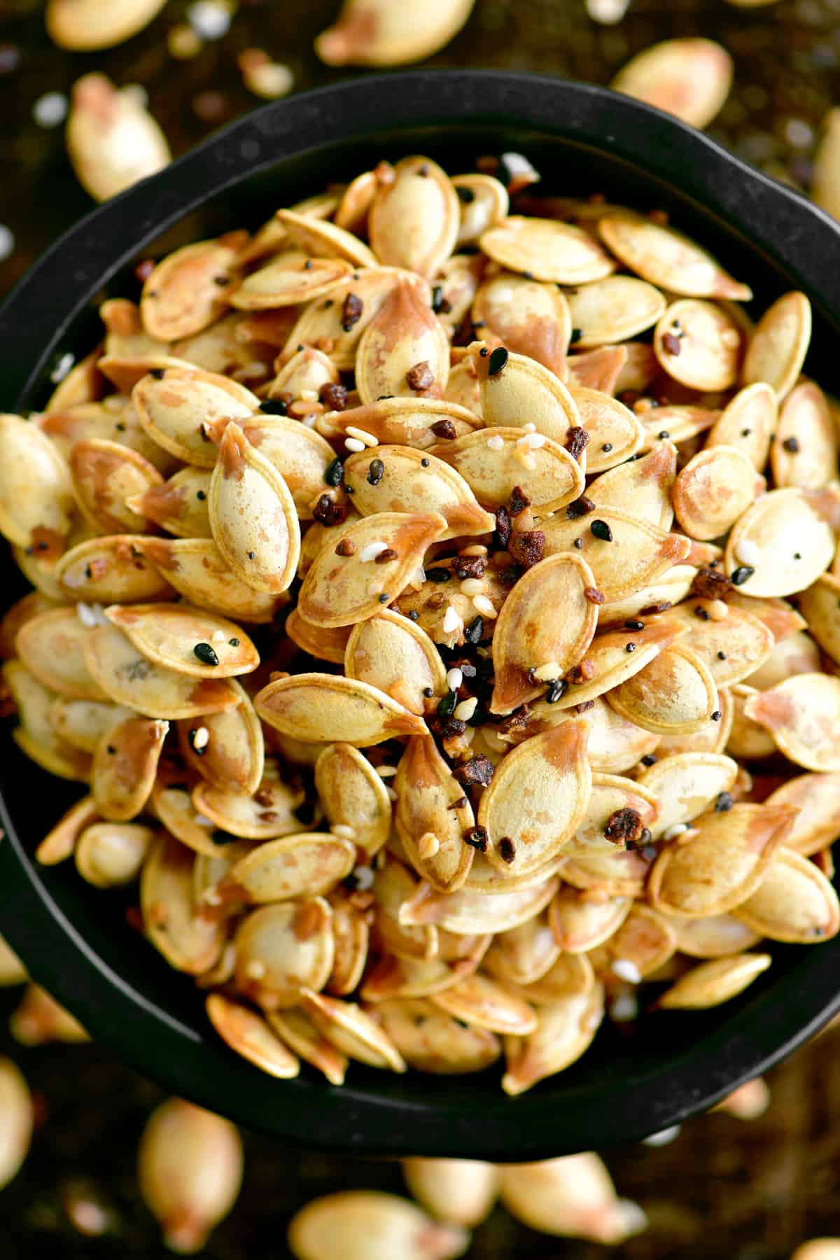 a topdown view of the pumpkin seeds in a bowl ready to enjoy!