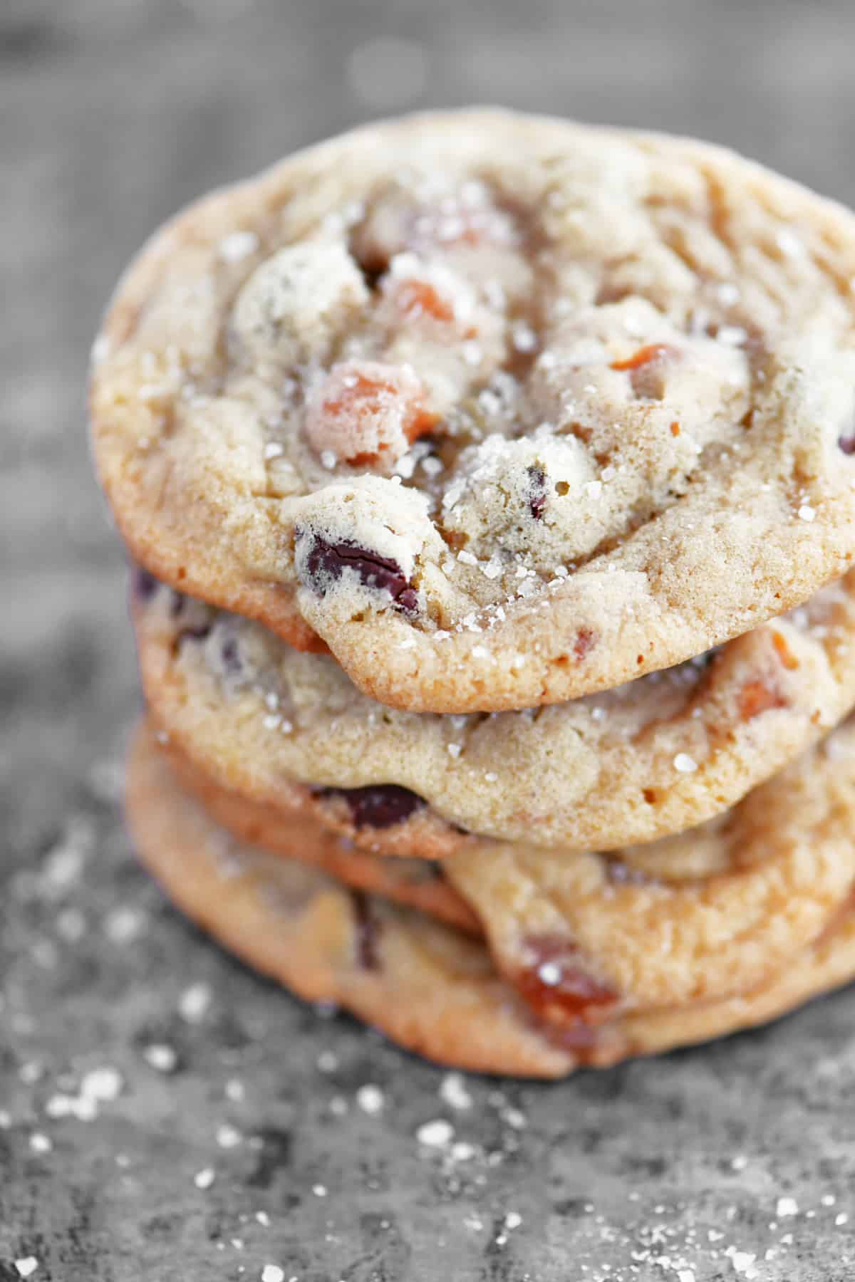 a stack of salted caramel chocolate chip cookies