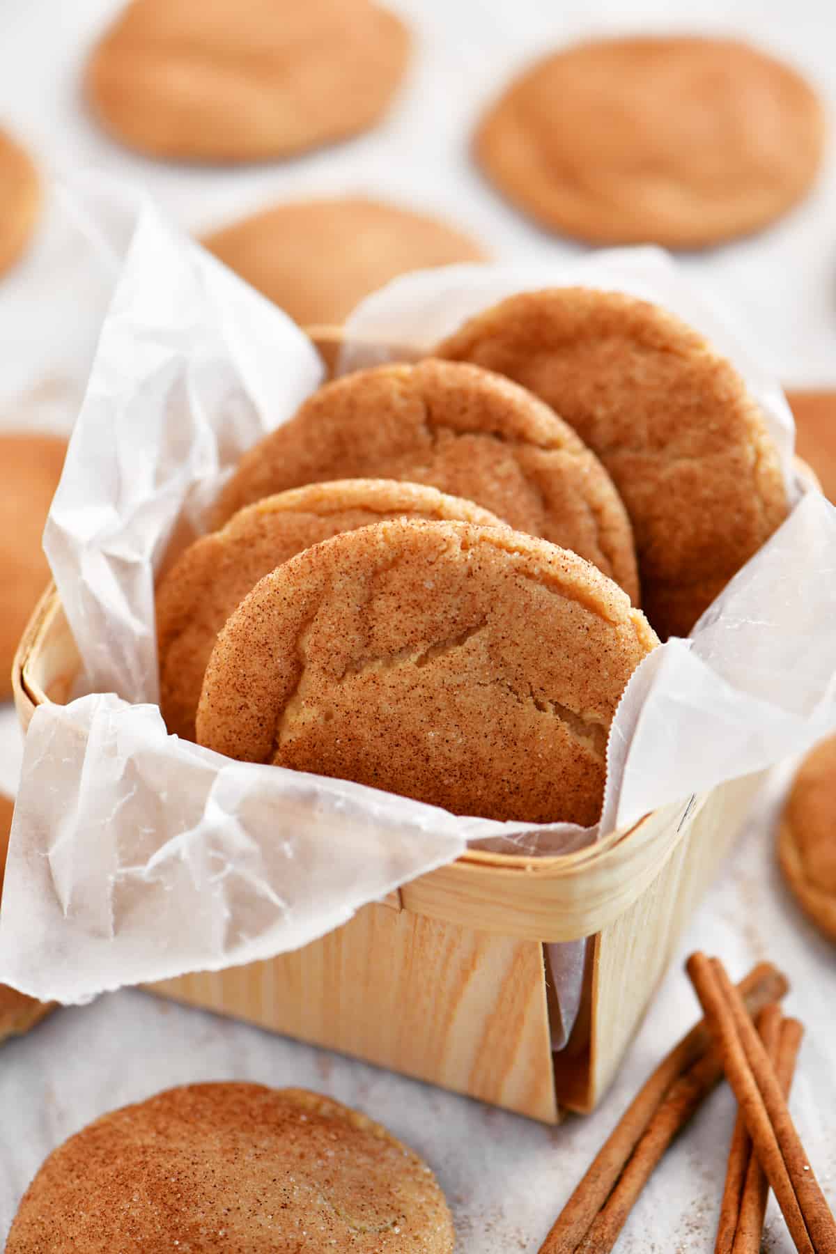 sugar coated snickerdoodle cookies in a cute little basket