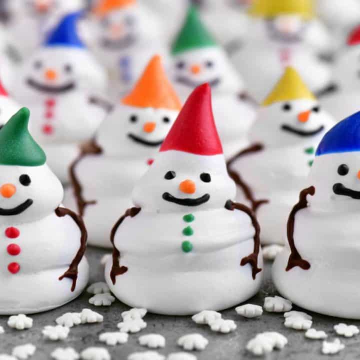 a gang of meringue snowman cookies