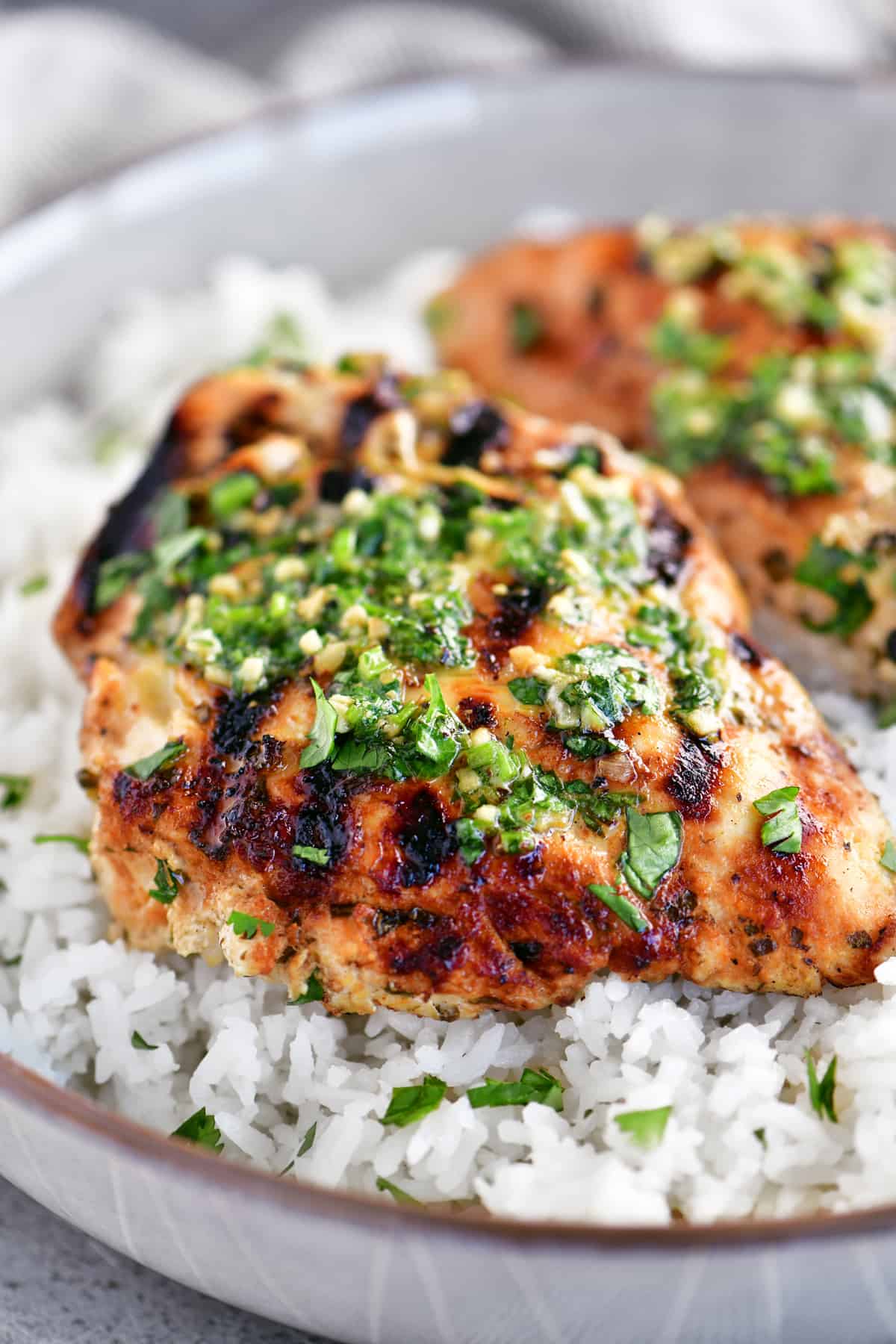 chicken breasts in a plate of rice