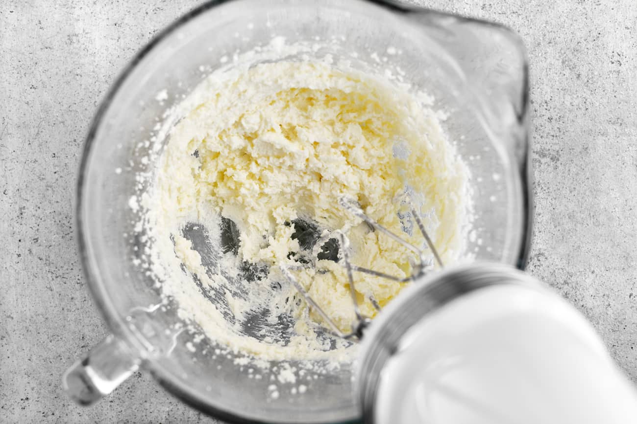 cream butter in a bowl with a mixer