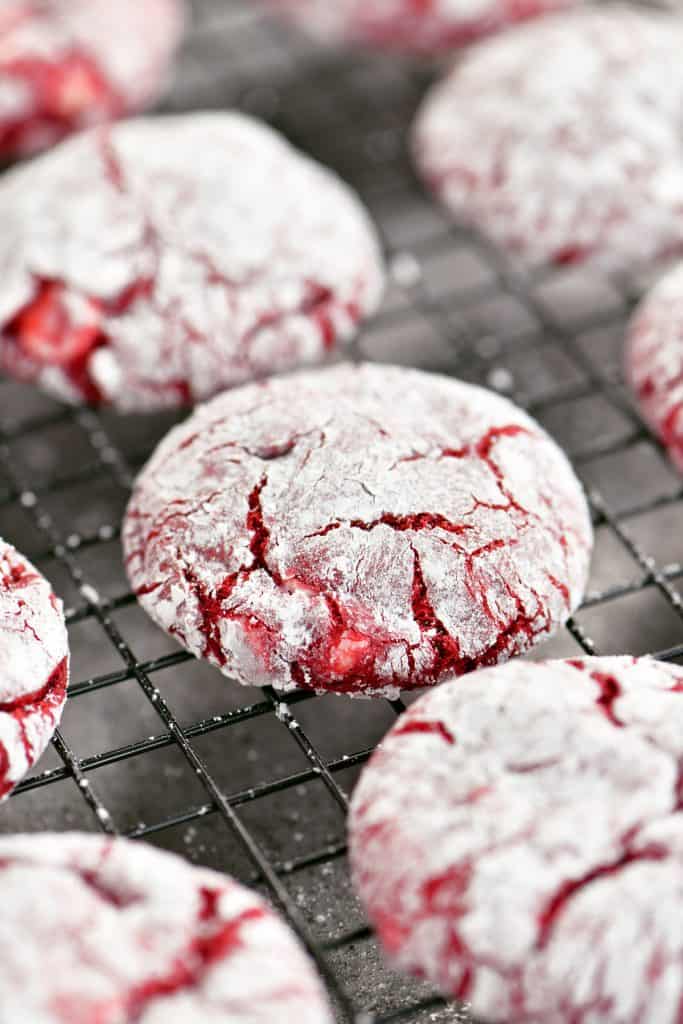 cake mix red velvet cookies cooling on a black wire rack