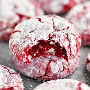 Red velvet crinkle cookies with white chocolate chips.