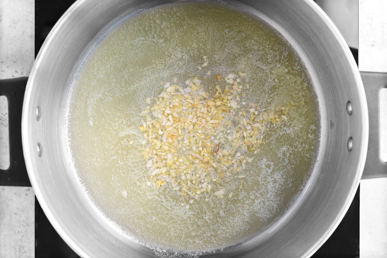 onion flakes and butter in a cooking pot