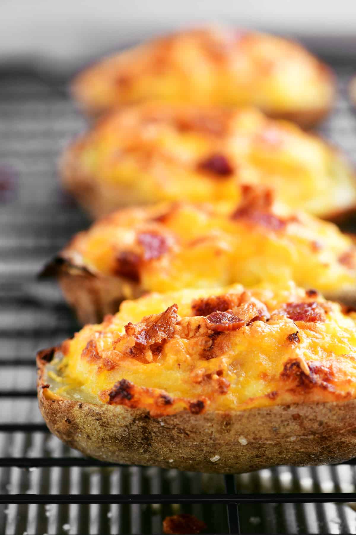bacon and cheddar melted on twice baked potatoes