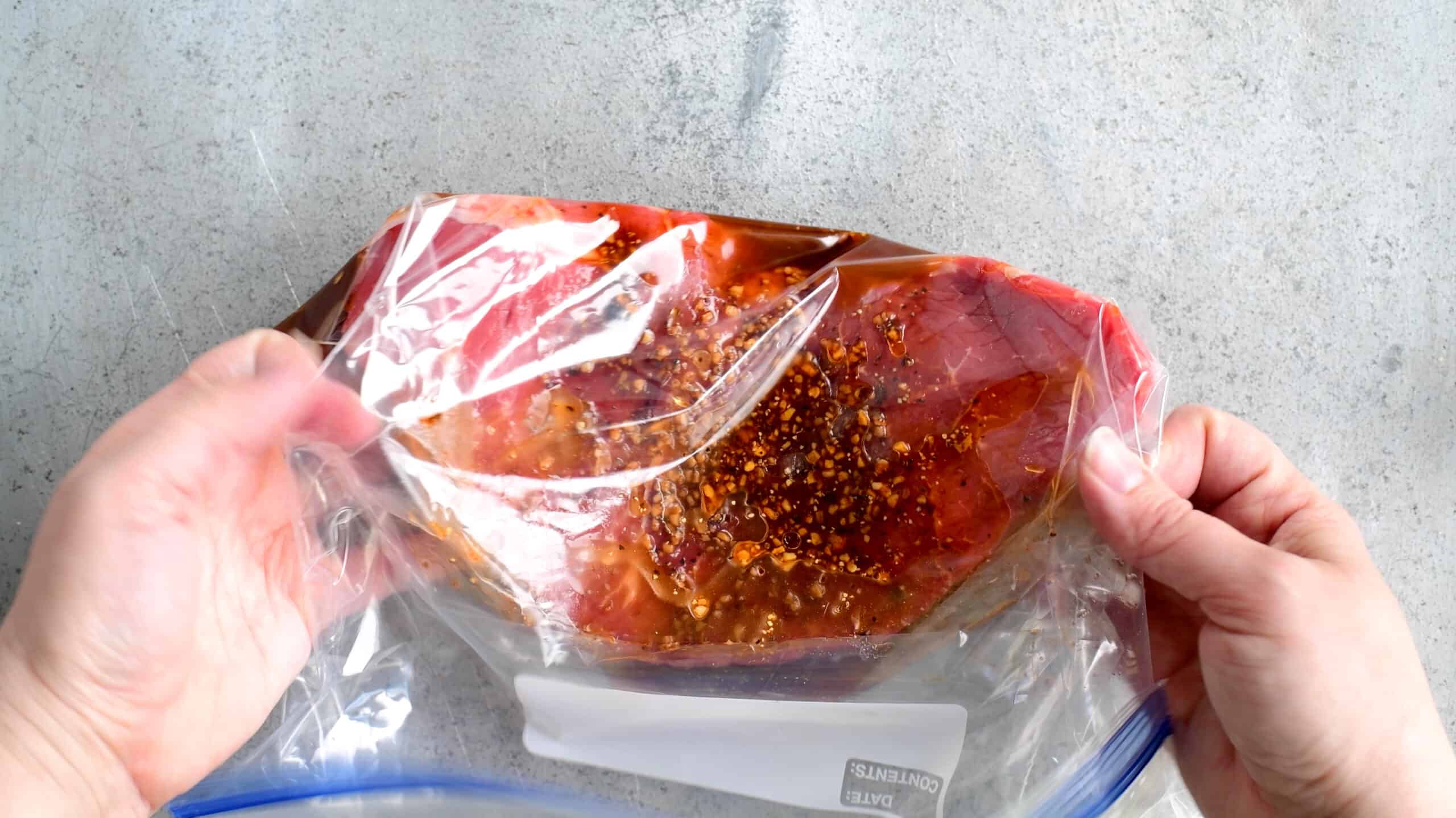 bag with steak and marinade