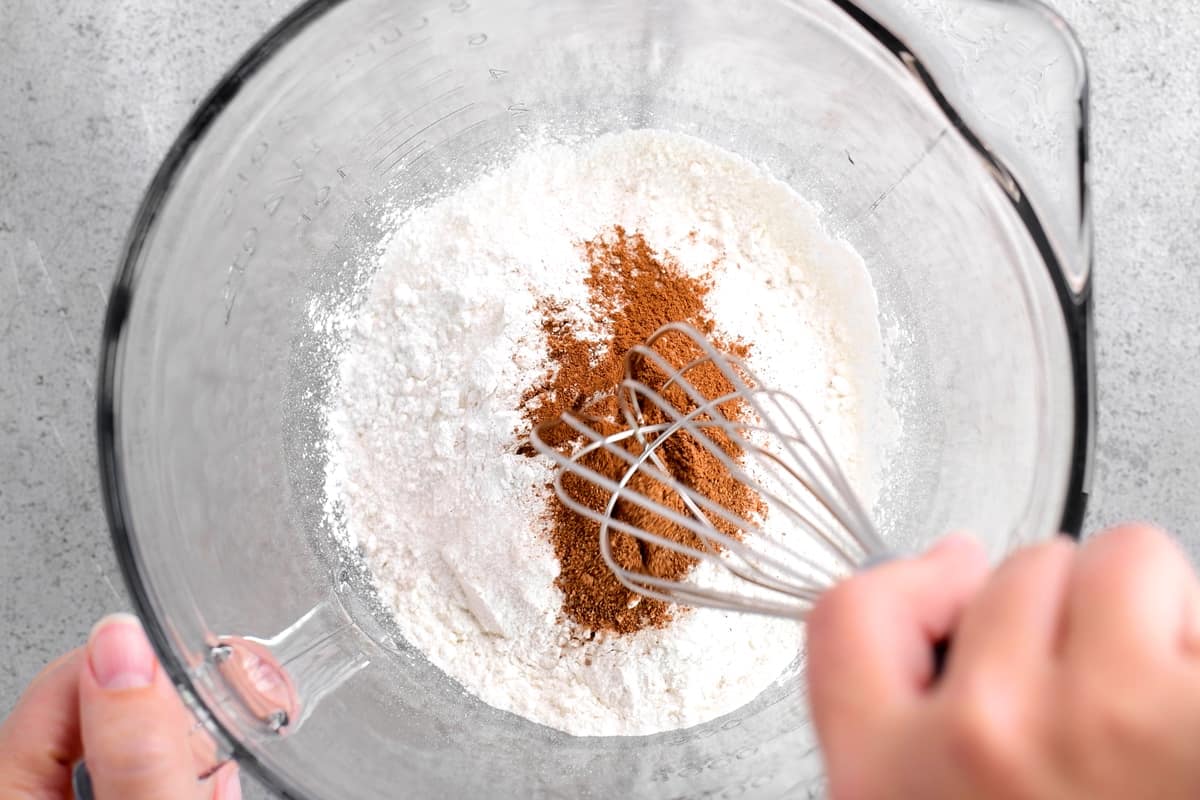 whisking dry ingredients in a bowl