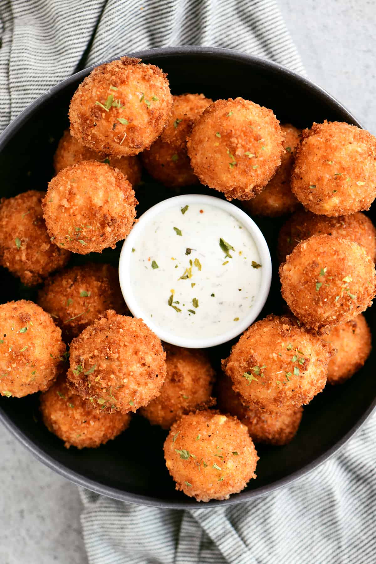 corn poppers on a tray with dip