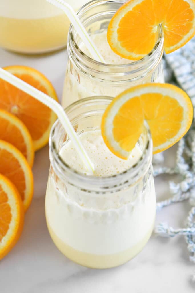 whipped orange julius in two glasses