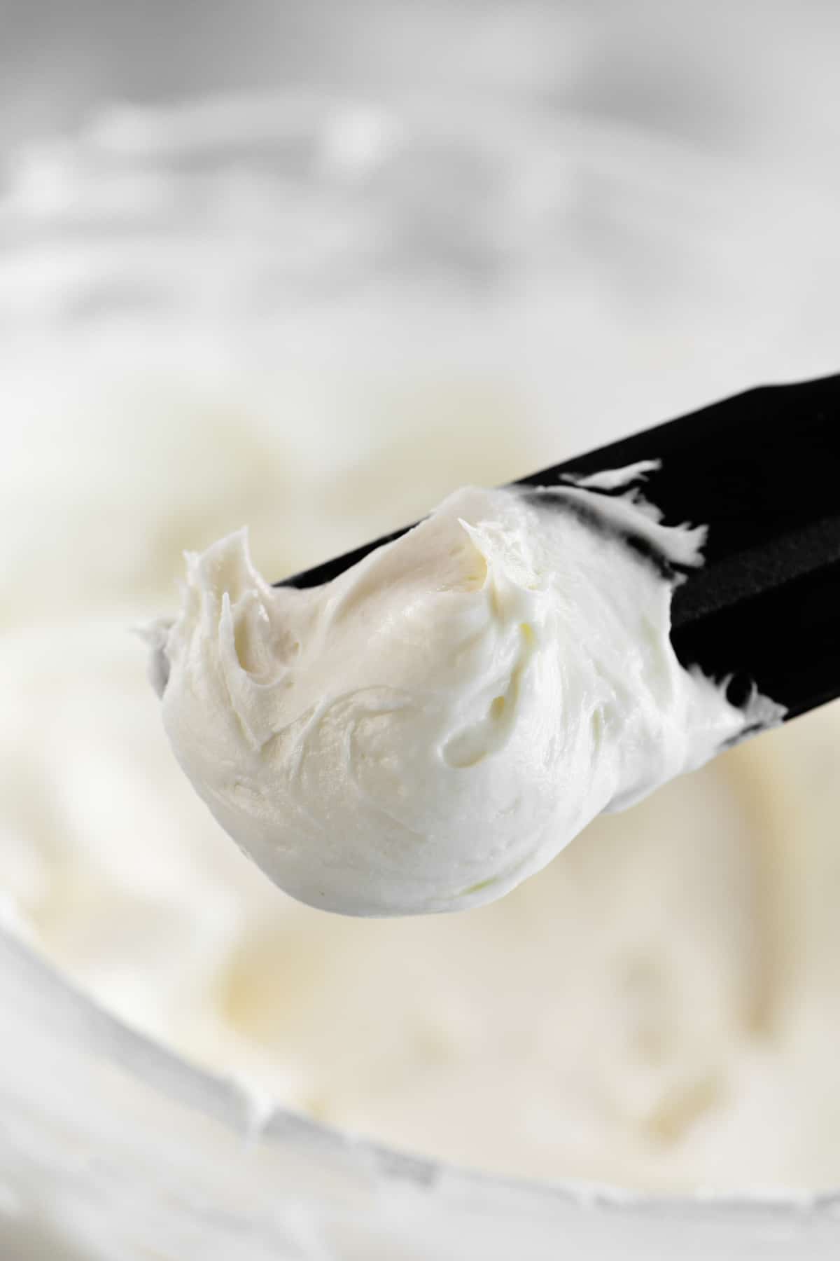 cream cheese buttercream on a spatula