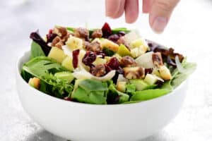 add toppings to salad