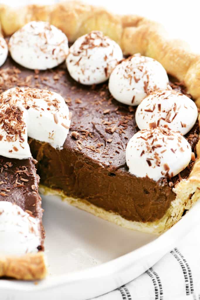 a chocolate pie with a piece removed