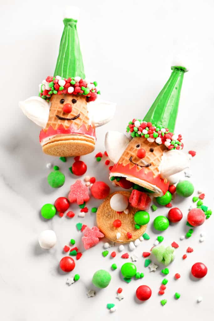 ice cream cones decorated to look like Christmas elves