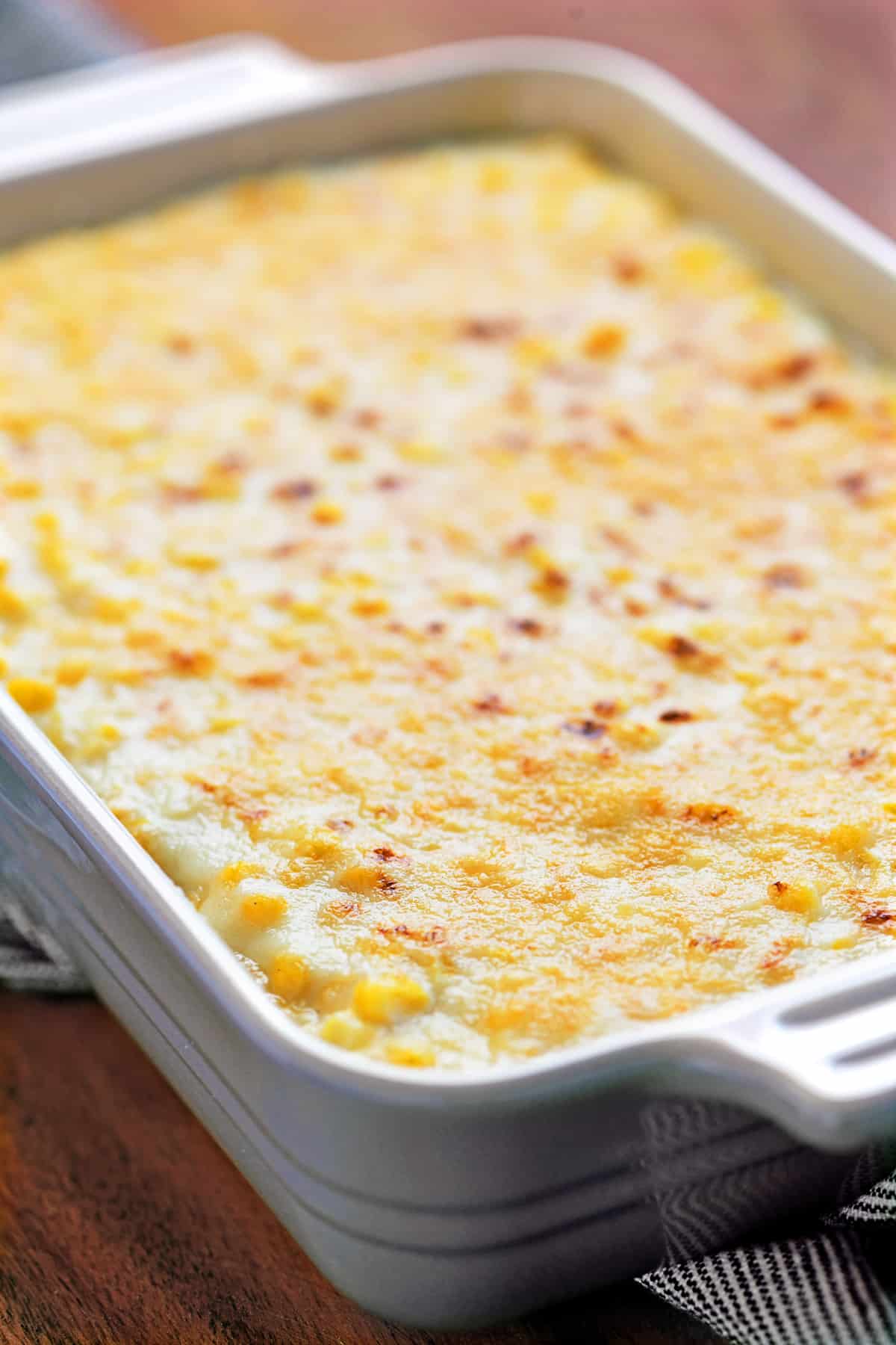 a baking dish with creamed corn inside