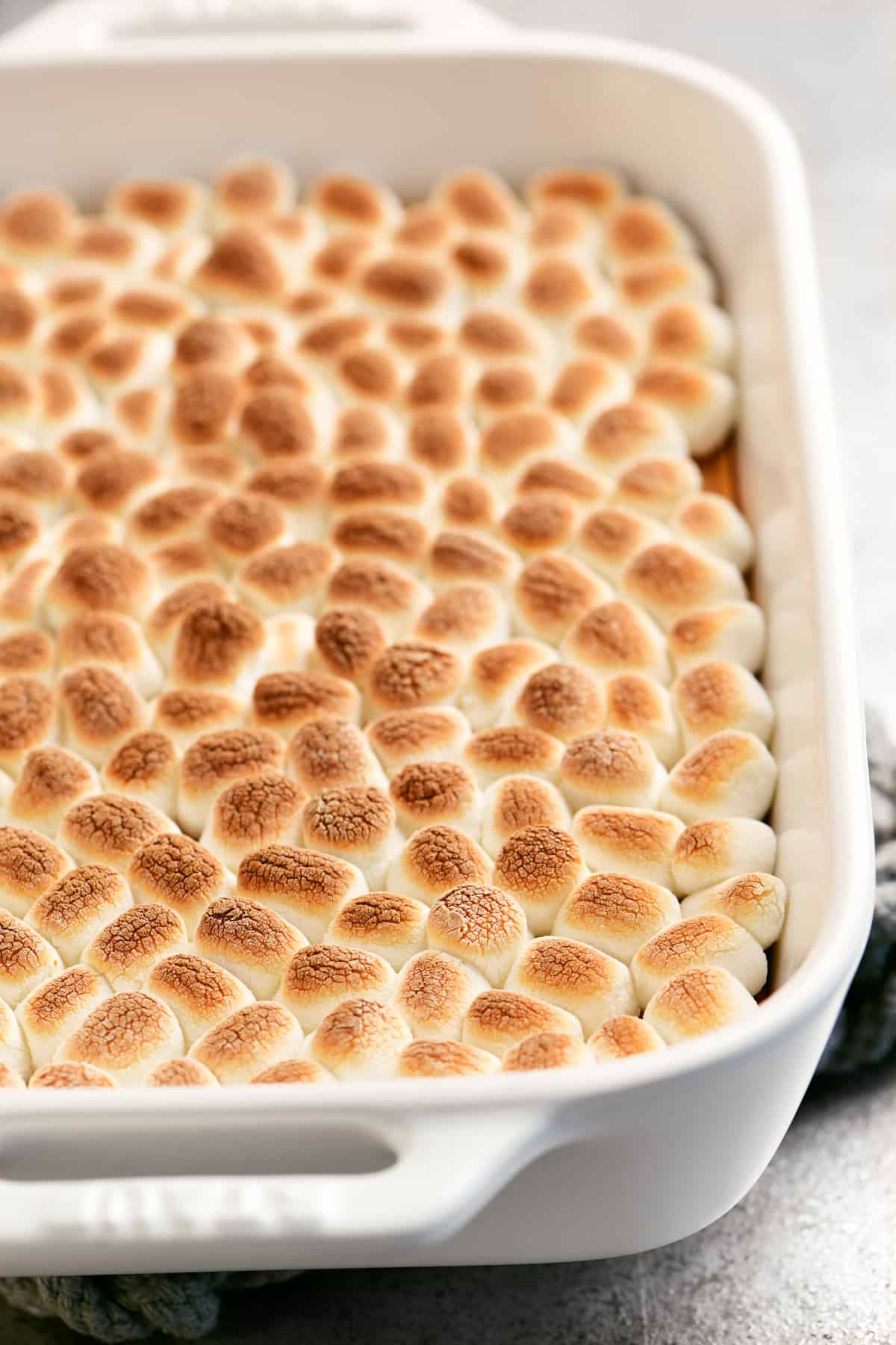 sweet potatoes with marshmallows in a serving dish